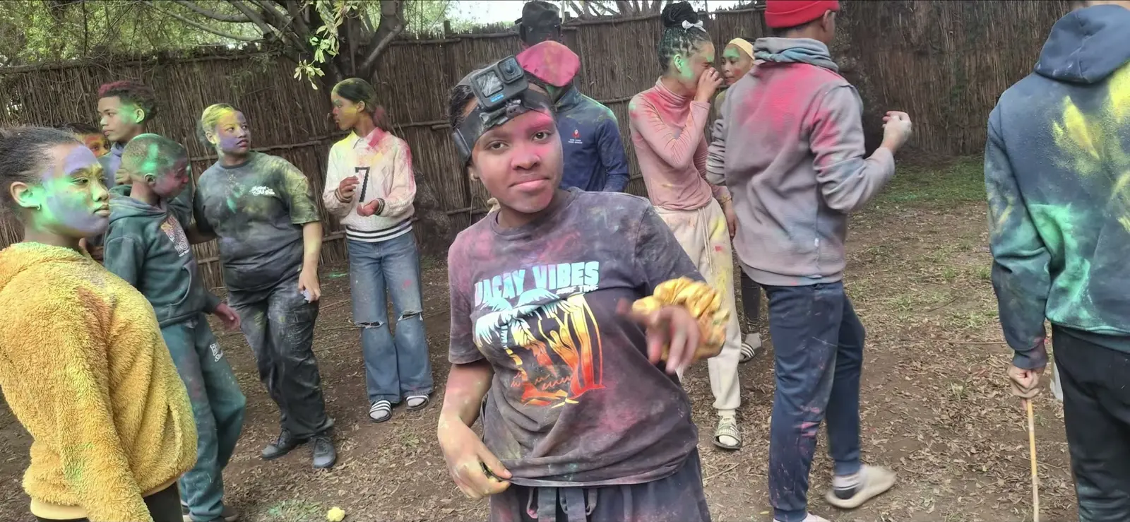 Campers covered in colour powder at the June camp