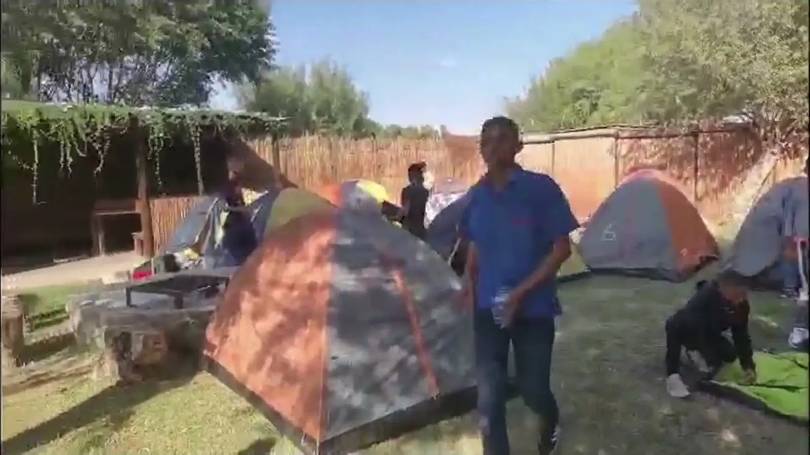 Camp tents set up on grass